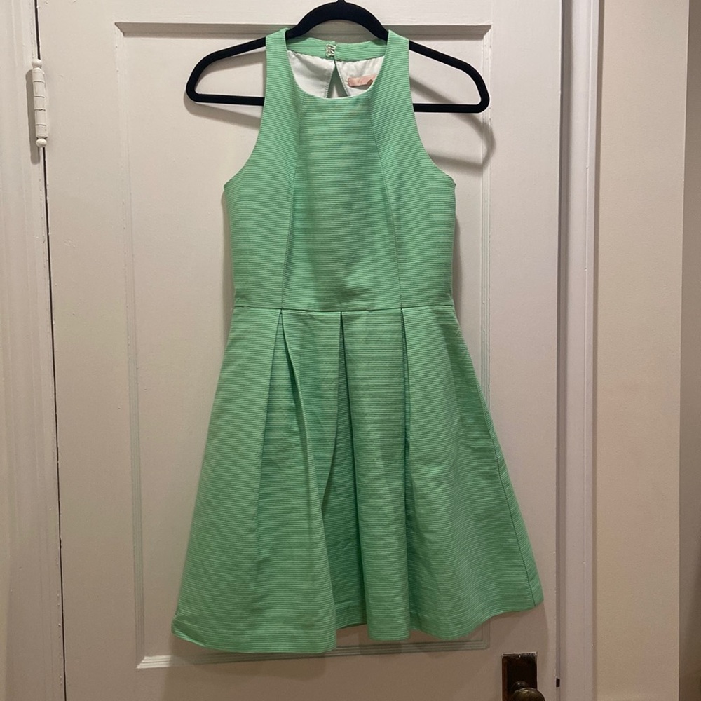 Green skater dress with open back